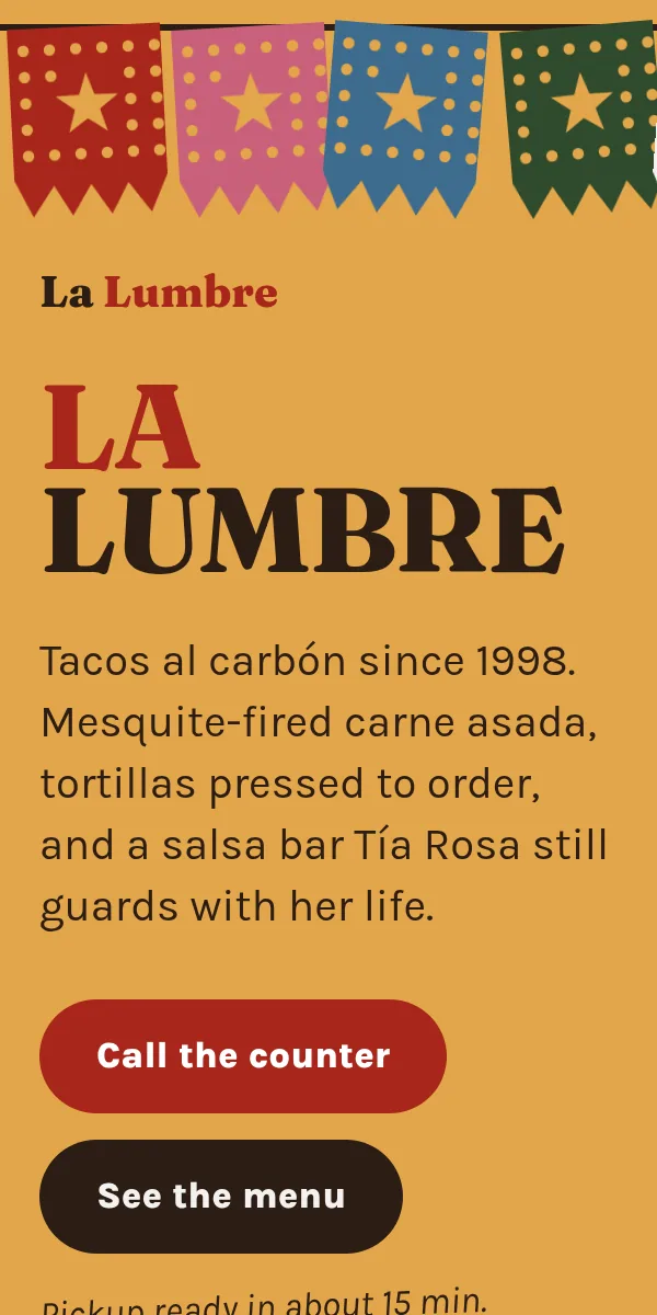 Taquería La Lumbre sample site on a phone: papel picado banner, the name in big letters and a Call the counter button.